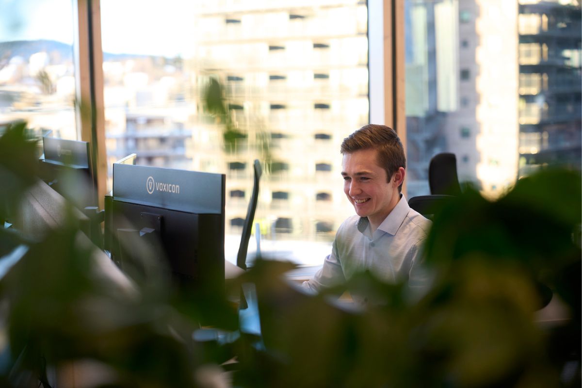 Smiling employee in office